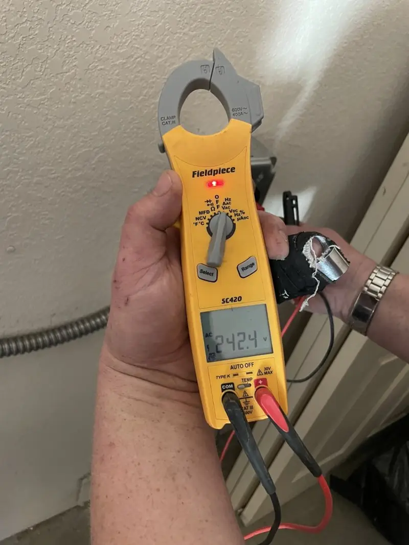 Voltage testing with clamp meter during Generator Installation in Lake City